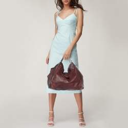 مملوكة مسبقًا Gucci Two Tone Burgundy Leather Stirrup Shoulder Bag