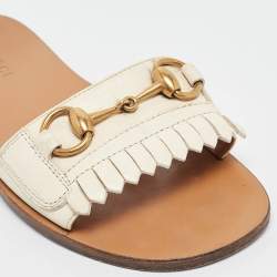 Pre Owned Gucci Cream Leather Horsebit Fringe Detail Flat Slides Size 34