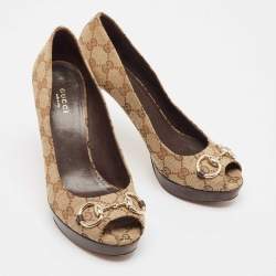 Pre Owned Gucci Beige/Brown GG Canvas Horsebit Peep Toe Platform Pumps Size 39
