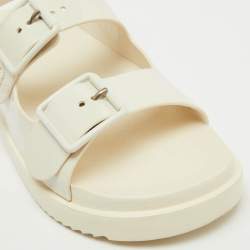 مملوكة مسبقًا Gucci Off White Rubber Mini Double G Logo Dusty Ankle Strap Flat Sandals Size 38