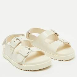 مملوكة مسبقًا Gucci Off White Rubber Mini Double G Logo Dusty Ankle Strap Flat Sandals Size 38