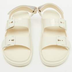 مملوكة مسبقًا Gucci Off White Rubber Mini Double G Logo Dusty Ankle Strap Flat Sandals Size 38