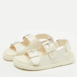 مملوكة مسبقًا Gucci Off White Rubber Mini Double G Logo Dusty Ankle Strap Flat Sandals Size 38