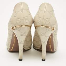 مملوكة مسبقًا Gucci Cream Guccissima Leather Peep Toe Pumps Size 36.5