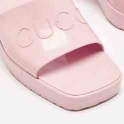 Pre Owned Gucci Pink Rubber Embossed Logo Slide Sandals Size 38