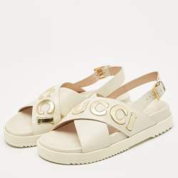 Pre Owned Gucci Off White Leather Logo Ankle Strap Flat Sandals 38.5
