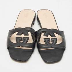 مملوكة مسبقًا صندل سلايدز غوتشي جلد أسود بتصميم حرف G مقاس 38.5