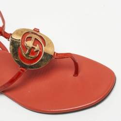 Pre Owned Gucci Orange Patent Leather GG Logo Buckle Flat Thong Sandals Size 37.5