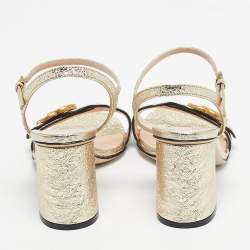 مملوكة مسبقًا صندل كعب كتلة مع حزام كاحل جلد غوتشي GG ذهبي متلألئ مقاس 36