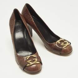 Pre Owned Gucci Brown GG Leather Interlocking Logo Round Toe Pumps Size 39.5