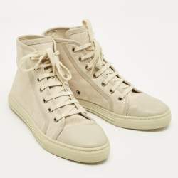 مملوكة مسبقًا حذاء رياضي غوتشي جلد وكانفاس جي جي كريمي برباط عنق مرتفع مقاس 37.5