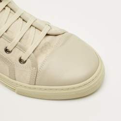 مملوكة مسبقًا حذاء رياضي غوتشي جلد وكانفاس جي جي كريمي برباط عنق مرتفع مقاس 37.5