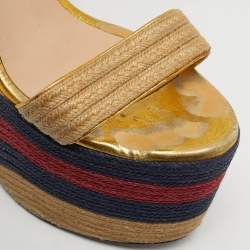 مملوكة مسبقًا صندل غوتشي كعب روكي إسبادريل سير كاحل نعل سميك ويب جوت وجلد ذهبي ميتالك مقاس 38