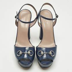 مملوكة مسبقًا صندل غوتشي منصة كعب سيور للكاحل جلد براءة أزرق كلوديي مزين بمسامير الحصان مقاس 39