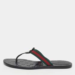 مملوكة مسبقًا Gucci GG Size 38 Black Canvas and Leather Thong Flat Sandals