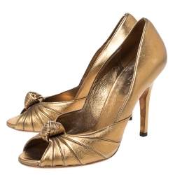 Pre Owned Gucci Metallic Gold Leather Knot Peep Toe Pumps Size 37.5