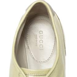 Pre Owned حذاء رياضي غوتشي منخفض من أعلي و برباط علوي و مزين بشريط ويب جلد لامع أصفر مقاس 38.5