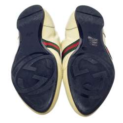 Pre Owned حذاء رياضي غوتشي منخفض من أعلي و برباط علوي و مزين بشريط ويب جلد لامع أصفر مقاس 38.5