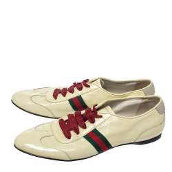 Pre Owned حذاء رياضي غوتشي منخفض من أعلي و برباط علوي و مزين بشريط ويب جلد لامع أصفر مقاس 38.5