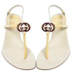 مملوكة مسبقًا Gucci Cream Patent Leather GG Interlocking Kitten Heel Thong Flat Sandals Size 36.5
