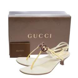 مملوكة مسبقًا Gucci Cream Patent Leather GG Interlocking Kitten Heel Thong Flat Sandals Size 36.5
