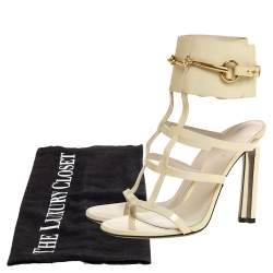 مملوكة مسبقًا صندل غوتشي أورسولا هورسبيت غلادياتور جلد لامع كريمي مقاس 37