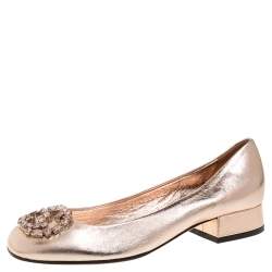 metallic rose gold pumps