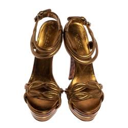 مملوكة مسبقًا صندل غوتشي أوركيد نعل سميك كعب تورتواز مزين ملتف جلد ذهبي ميتاليك مقاس 36