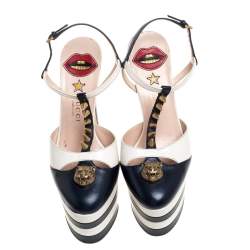 مملوكة مسبقًا صندل غوتشى سيور كاحل نعل سميك مرصع سبايك جلد أبيض وأزرق مقاس 37