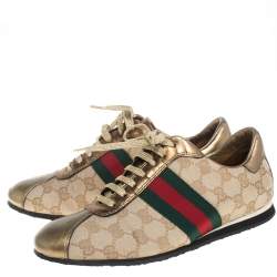 Pre Owned حذاء رياضي غوتشي برقبة منخفضة كانفاس جي جي وجلد ويب بعنق منخفض ذهبي / بيج مقاس 37.5