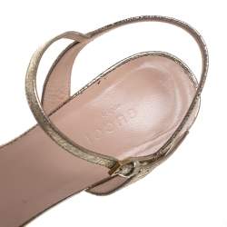 مملوكة مسبقًا Gucci Metallic Gold Foil Leather Marmont Block Heel Ankle Strap Sandals Size 38