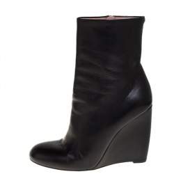 مملوكة مسبقًا حذاء بوت غوتشى منتصف ساق كعب روكى جلد أسود مقاس 38.5