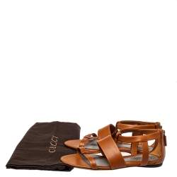 مملوكة مسبقًا Gucci Tan Leather T Strap Flat Sandals Size 36.5