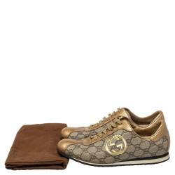 مملوكة مسبقًا حذاء رياضي غوتشي جلد بيج/ذهبي وكانفاس جي جي بعنق منخفض مقاس 37.5