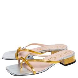 مملوكة مسبقًا Gucci Metallic Gold/Silver Leather Alison Bow Sandals Size 39.5