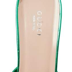 مملوكة مسبقًا صندل سلايد غوتشي جلد أخضر ميتاليك مزين عقدة مقاس 41.5