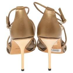 مملوكة مسبقًا Gucci Gold Leather Criss Cross Ankle Strap Open Toe Sandals Size 39