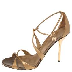 مملوكة مسبقًا Gucci Gold Leather Criss Cross Ankle Strap Open Toe Sandals Size 39
