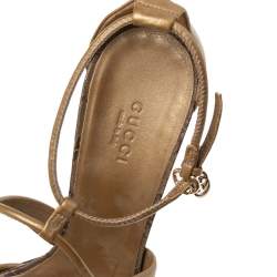 مملوكة مسبقًا Gucci Gold Leather Criss Cross Ankle Strap Open Toe Sandals Size 39