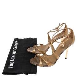 مملوكة مسبقًا Gucci Gold Leather Criss Cross Ankle Strap Open Toe Sandals Size 39