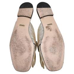 مملوكة مسبقًا Gucci Metallic Gold Leather Marmont Kiltie GG Fringe Mules Size 42