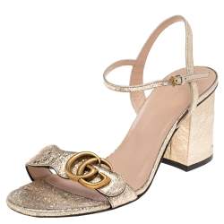 Pre Owned صندل غوتشي جلد ذهبي ميتالك جي جي سير كاحل مقاس 36.5