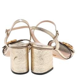 Pre Owned صندل غوتشي جلد ذهبي ميتالك جي جي سير كاحل مقاس 36.5