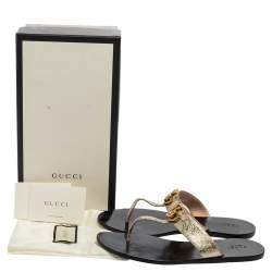 مملوكة مسبقًا صندل فلات إصبع غوتشي جي جي مارمونت جلد مجعد ذهبي مقاس 40