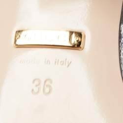 مملوكة مسبقًا Gucci Silver Laminated Leather Double G Fringe Pumps Size 36