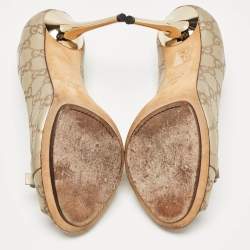 Pre Owned Gucci Gold Guccissima Leather Bow Detail Peep Toe Pumps Size 40