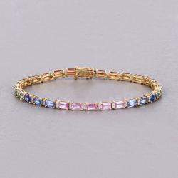 Pre Owned سوار التنس من الذهب الأصفر عيار 14 بحوالي 10.19 قيراط ياقوت متعدد وألماس بطول 7.25 بوصة