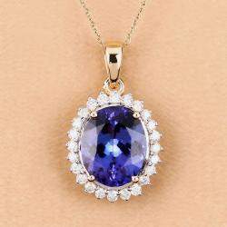 مملوكة مسبقًا 4.34 cts Tanzanite and Diamond 14K Yellow Gold Halo Pendant