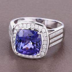 مملوكة مسبقًا خاتم هالو من التنزانيت والألماس بوزن 5.11 قيراط من الذهب الأبيض عيار 14 ومقاس أمريكي 7