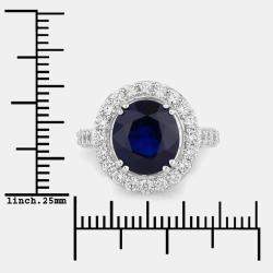 مملوكة مسبقًا خاتم هالو من الياقوت الأزرق السيلاني والألماس بوزن 4.74 قيراط من الذهب الأبيض عيار 18 ومقاس أمريكي 7